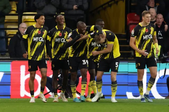 Watford celebrate Edo Kayembe's goal against Rotherham