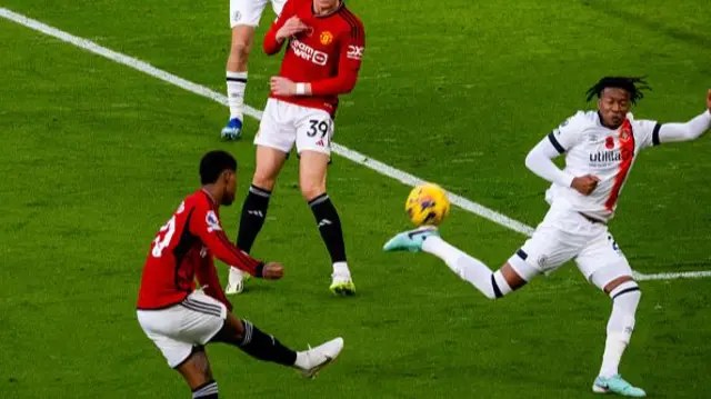 Marcus Rashford shoots inside the box