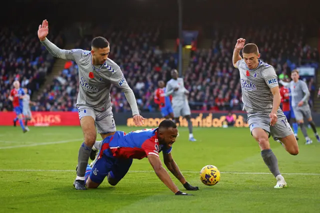 Jordan Ayew goes down after being challenged