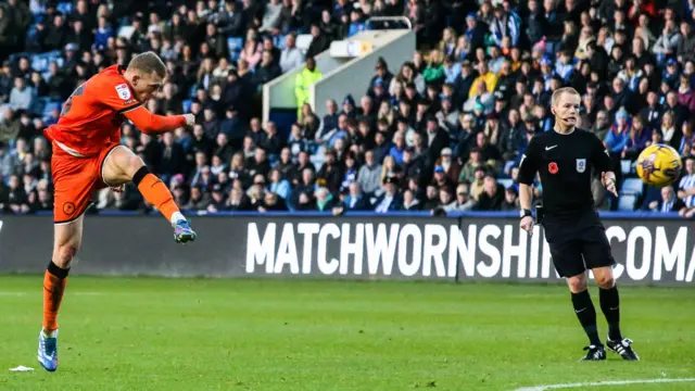 George Saville scores Millwall's second goal at Sheffield Wednesday
