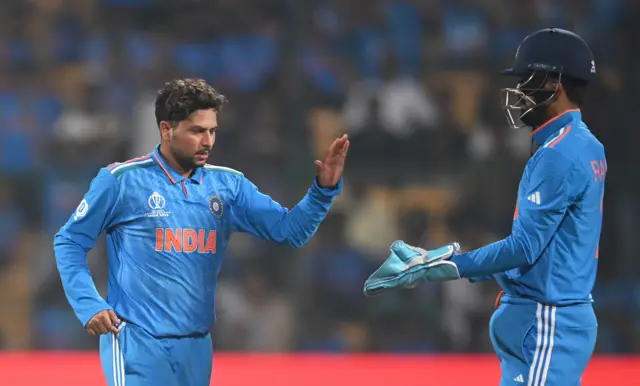 Kuldeep Yadav celebrates the wicket of Colin Ackermann