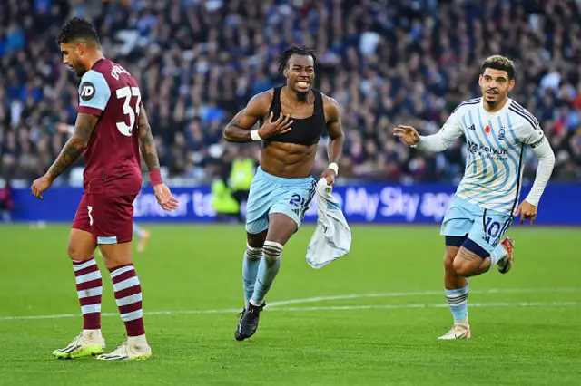 Anthony Elanga celebrates by taking his shirt off