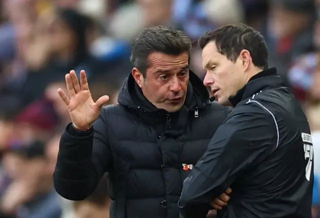 Marco Silva speaking to the assistant referee