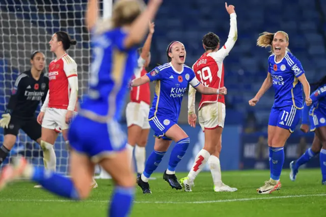 Tierney celebrates opening the scoring for Leicester v Arsenal by screaming in delight and waving her arms.