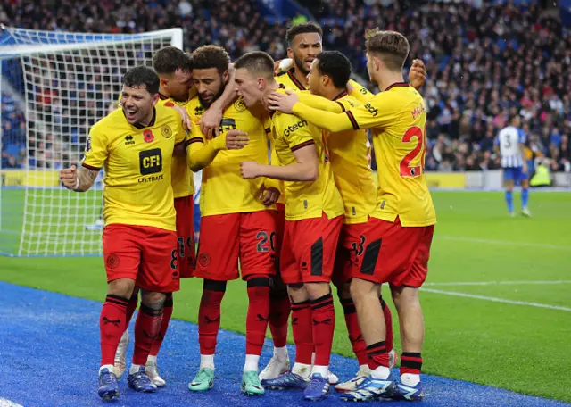 Sheffield United players celebrate their equalising goal