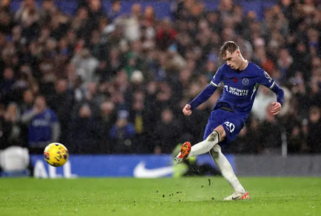 Cole Palmer shoots form the penalty spot