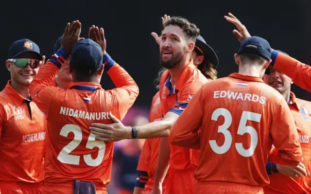 Paul van Meekeren celebrates with Teja Nidamanuru after dismissing Shubman Gill