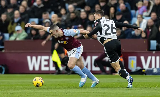 Joao Palhinha competing with Aston Villa's John McGinn