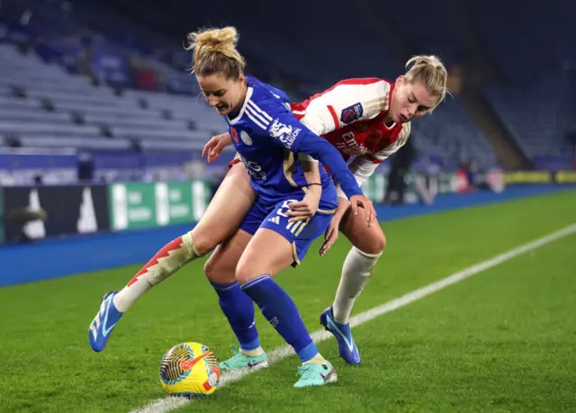 Russo holds a Leicester player in the corner.