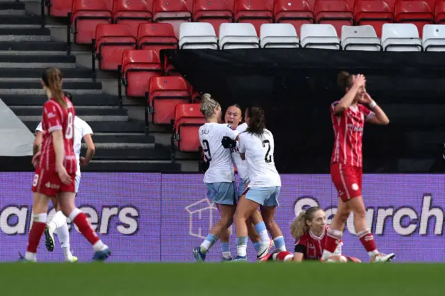 Villa players hug and scream in delight at making the breakthrough, Bristol players lay strewn distraught on the pitch.