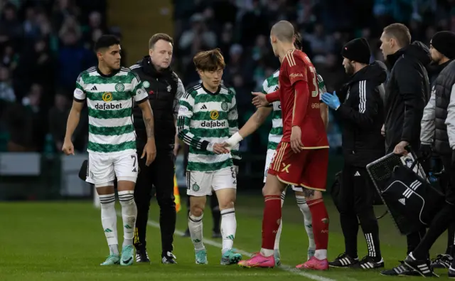 Kyogo makes his way off the pitch at Celtic Park