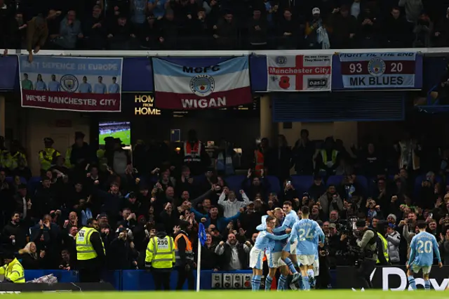 Erling Haaland of Manchester City celebrates with teammates