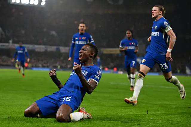 Nicolas Jackson of Chelsea celebrates sliding on his knees