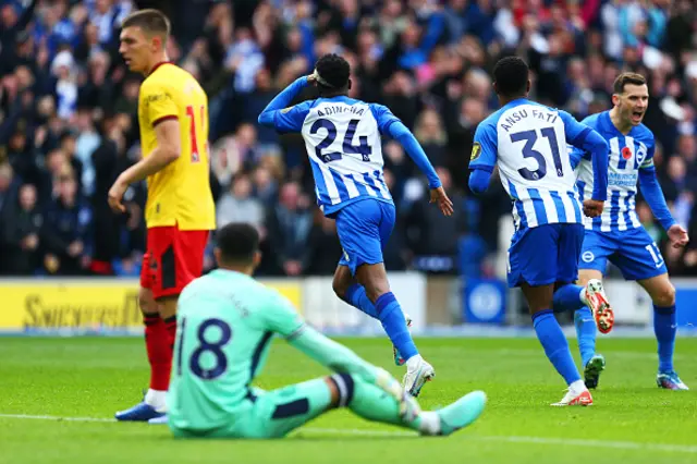 Simon Adingra of Brighton & Hove Albion celebrates with teammate Ansu Fati