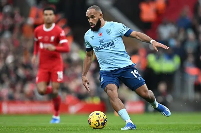 Bryan Mbeumo runs with the ball