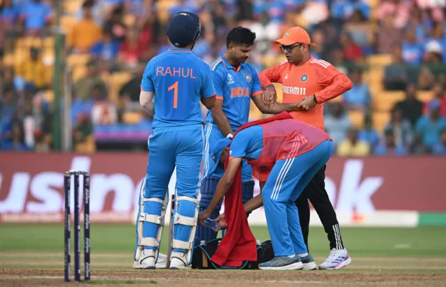 Shreyas Iyer receives treatment on an arm injury