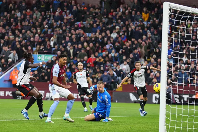 Ollie Watkins looks on as the ball goes in