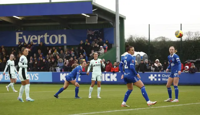 Jessie Fleming fires Chelsea ahead as Everton defenders look on.