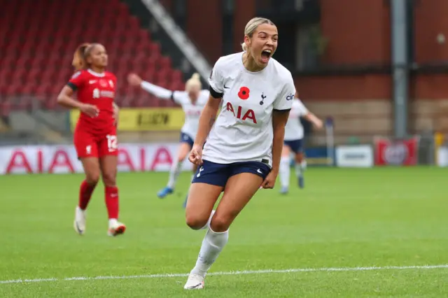 Bizet screams in delight as she celebrates opening the scoring.