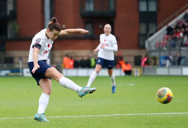 Angharad James takes aim at goal.