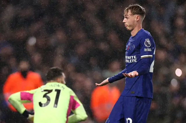 Cole Palmer celebrates after his penalty