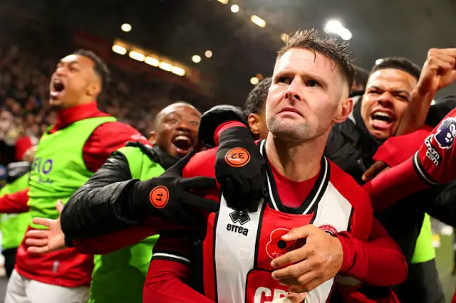 Oliver Norwood celebrates with teammates