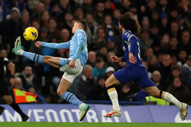 Phil Foden controls the ball in front of Chelsea's Spanish defender Marc Cucurella