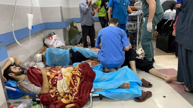 A wounded patient rests at Al-Shifa hospital in Gaza City