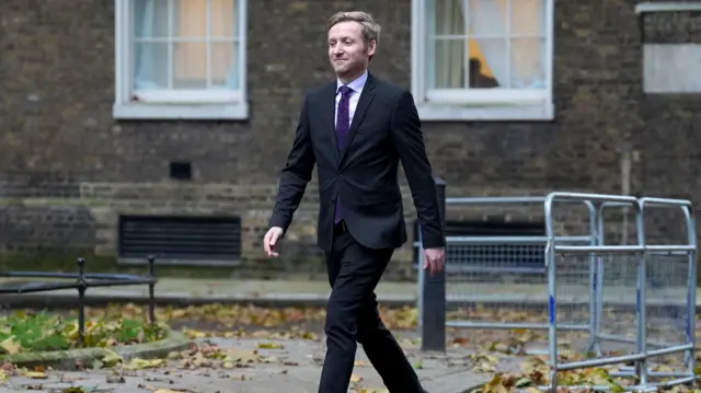 Lee Rowley arriving at Downing Street