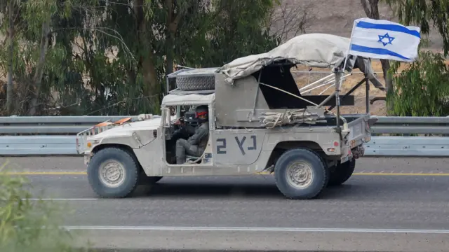 Israeli soldiers seen in military vehicles on the Gaza border - 13 November 2023