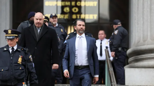 Donald Trump Jr leaves after attending the Trump Organization civil fraud trial, in New York State Supreme Court in Manhattan