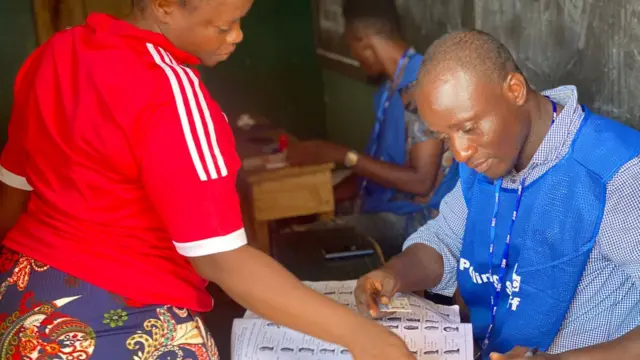 A man casting a vote in Monrovia, Liberia