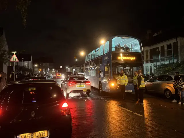 Bus waiting on street