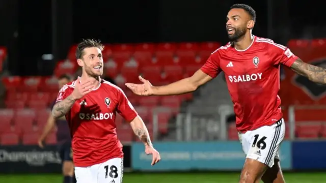 Curtis Tilt celebrates a goal for Salford