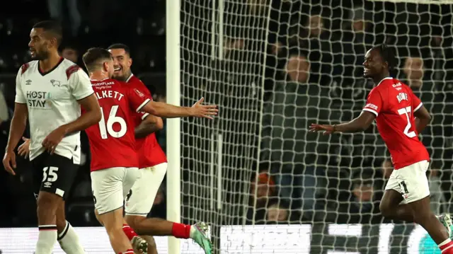 Aaron Rowe celebrates a goal for Crewe