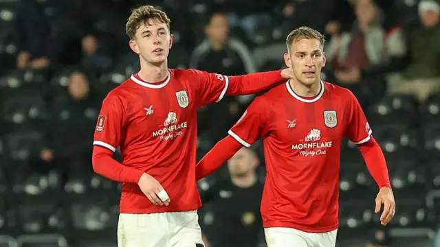 Crewe celebrate a goal at Derby