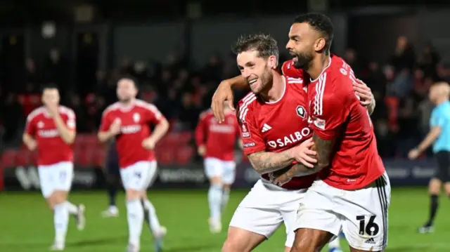 Salford celebrate a goal