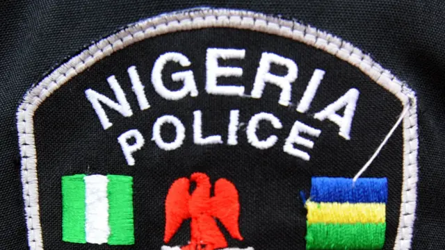 A picture taken on March 28, 2012 in Lagos shows a Nigerian police arm badge