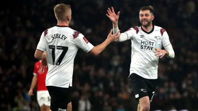 Tom Barkhuizen celebrates a goal for Derby