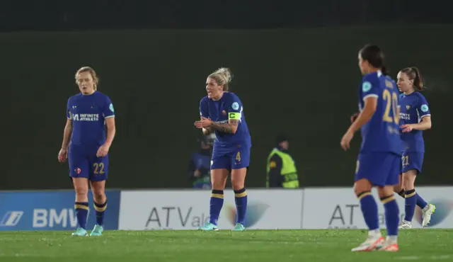 Bright gees up her teammates after they concede the opener.