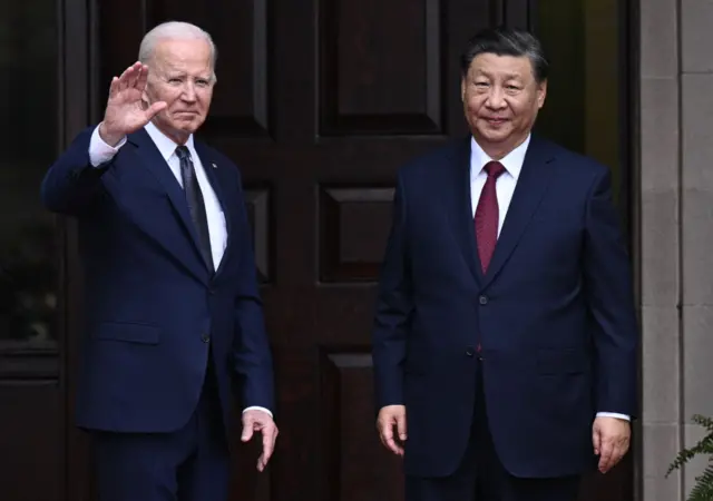 President Biden greets Chinese President Xi Jinping before a meeting