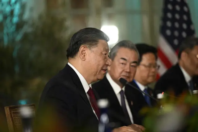 Chinese President Xi Jinping speaks during a meeting with US President Joe Biden