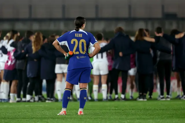 Kerr stands stunned as Madrid players congrstulate one another in the background.