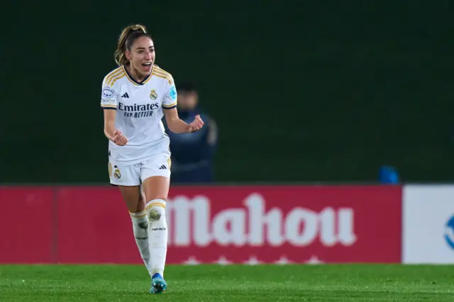 Carmona celebrates her goal by pumping her fists to the crowd.