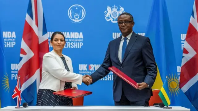 Priti Patel agreeing the deal with Rwanda in April 2022