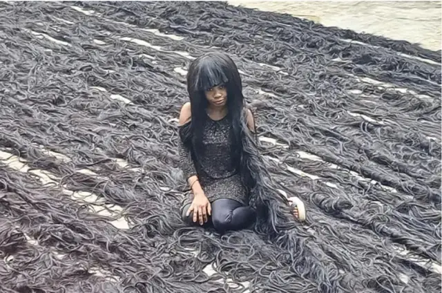 Hellen Williams, from Lagos city, set the record after making the wig stretching more than 350m