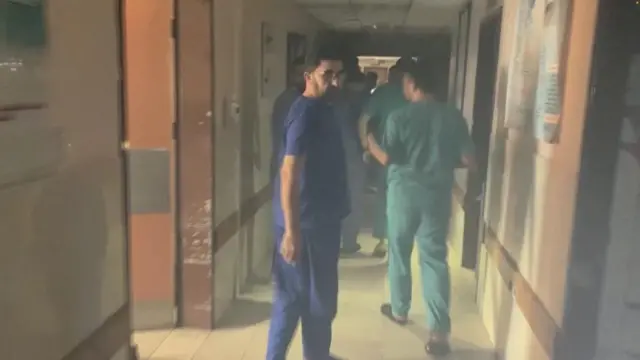 Medics look at the damages in the smoke-filled wards inside Al Shifa hospital following an Israeli raid, amid the ongoing conflict between Israel and the Palestinian group Hamas, in Gaza City, Gaza November 15, 2023.