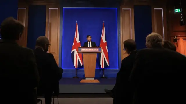 British Prime Minister Rishi Sunak speaks to the media at a news conference in Downing Street in London, Britain, 15 November 2023. Sunak said he is not giving up on deporting asylum seekers to Rwanda and suggested he would be willing to change British laws to make it happen, as he tried to stave off a furious backlash on the right of his Conservative Party after the Supreme Court ruled his plan was illegal.