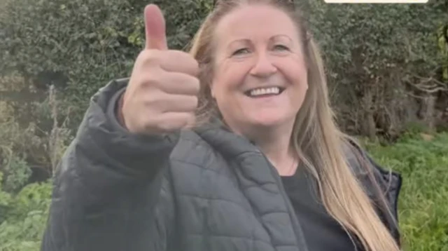 Listener Dawn, giving the thumbs up, after bringing the refuelling flapjacks for Vernon Kay