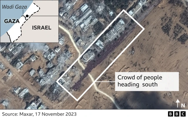 Satellite image showing a large crowd of people heading towards southern Gaza